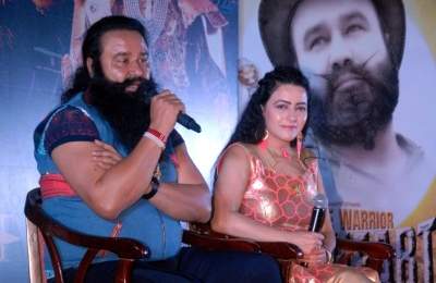 Gurmeet Ram Rahim and Honeypreet IANS