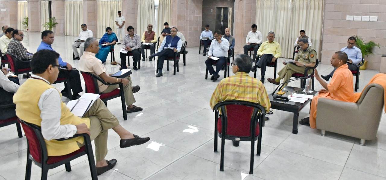 Yogi Meeting With Officials Social Distancing (Photo: