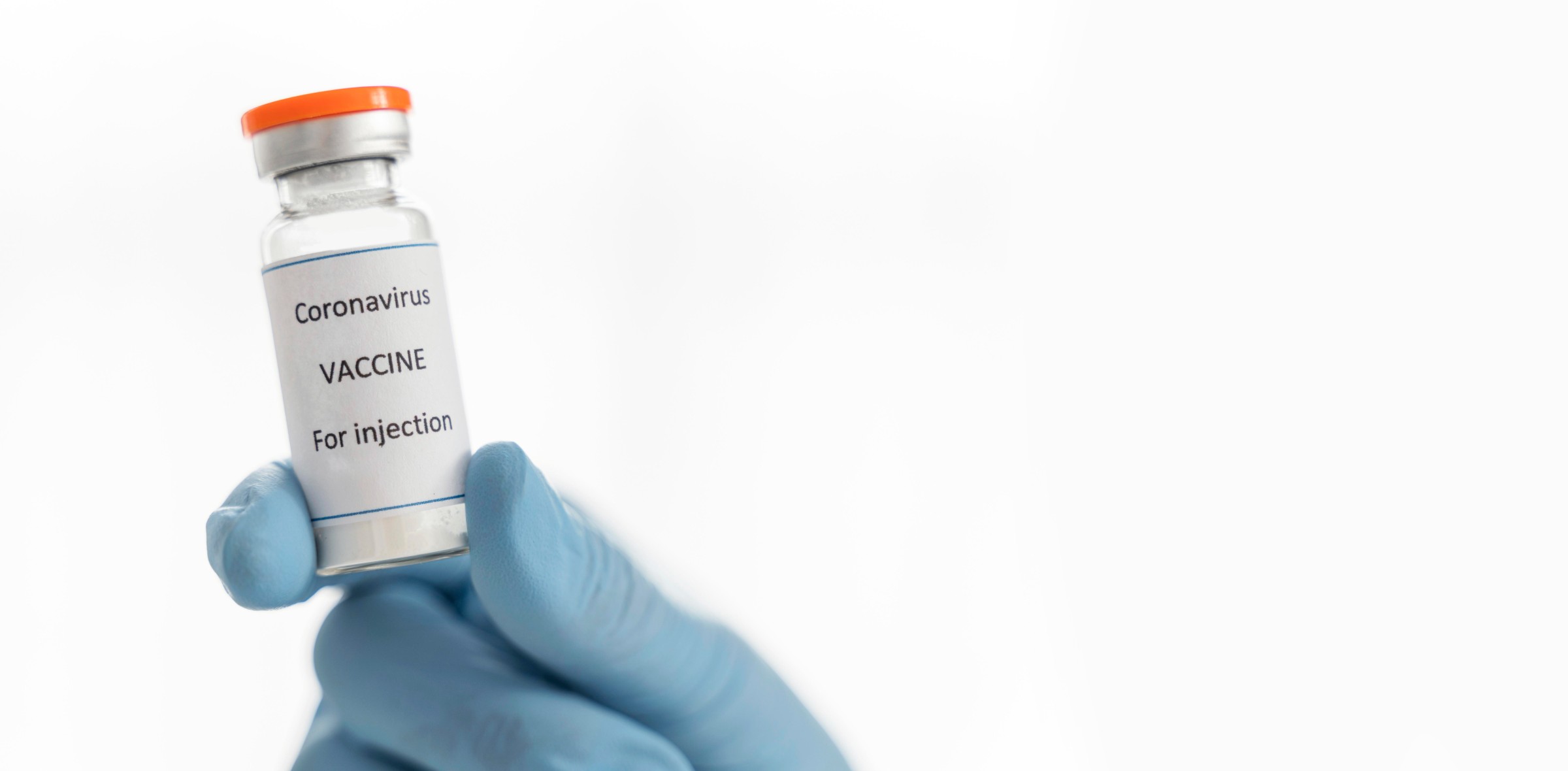 doctor-holding-coronavirus-vaccine-recipient-with-copy-space (1)