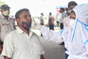 New Delhi: Health worker collect swab sample for Covid-19 testing at Shastri park in New Delhi on Sunday June 13, 2021.(Photo: Wasim Sarvar/IANS)